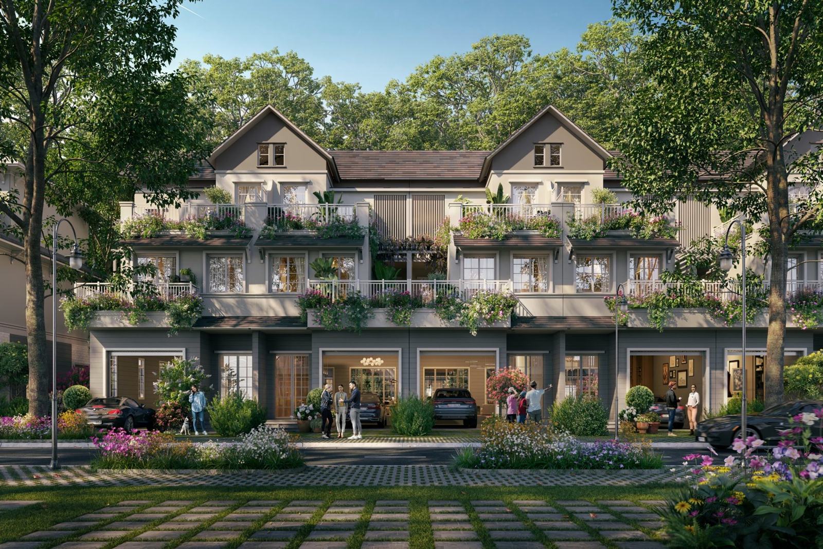 Dãy nhà phố vườn Home Retreat với ban công hoa và gara